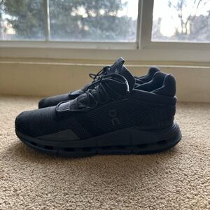 On Running women’s Black Low-Top Running Sneakers